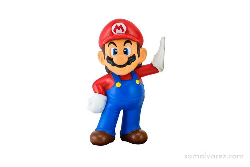 Super Mario toy character isolated on white.